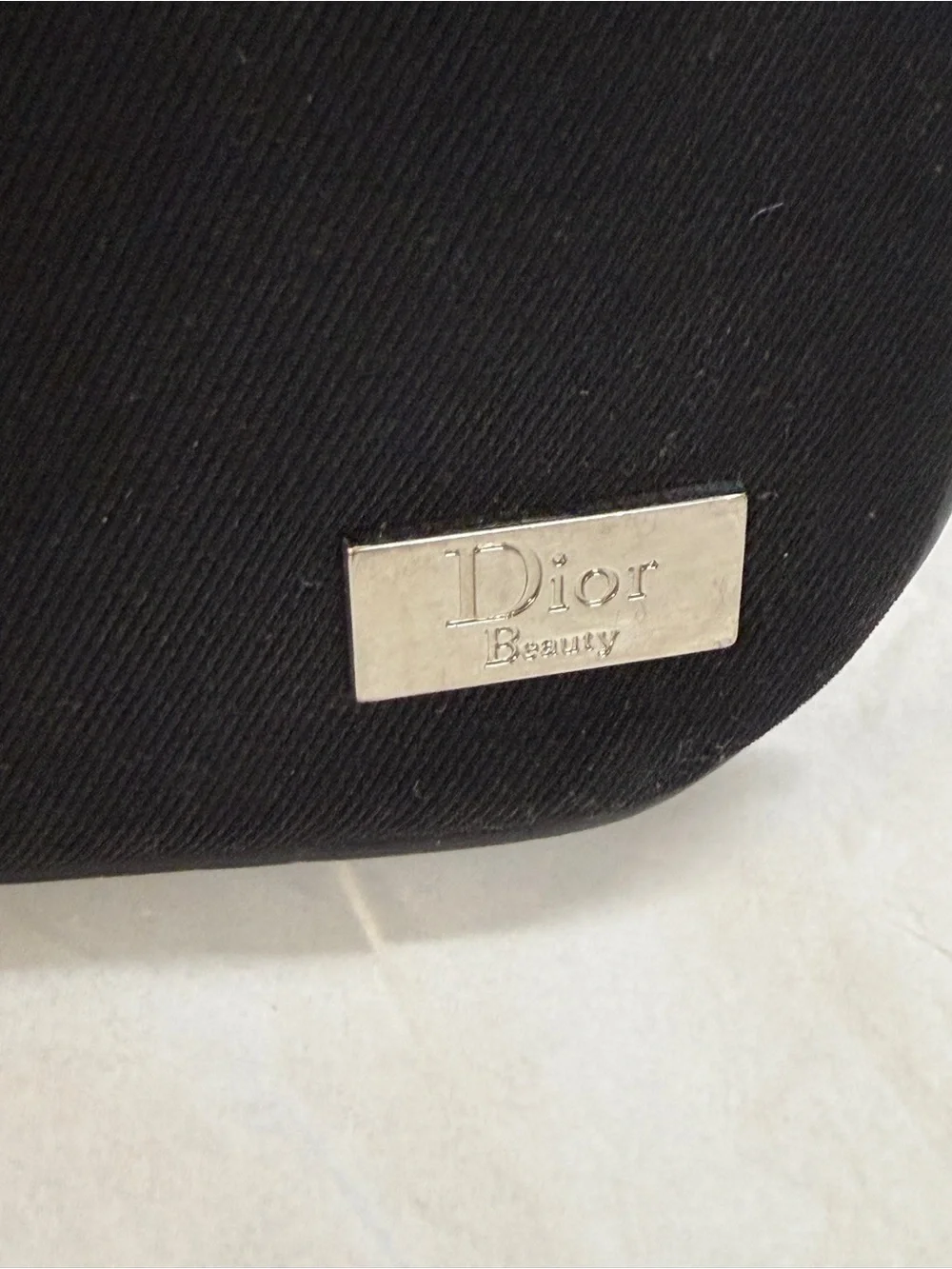 Dior Beauty black canvas pouch with silver logo